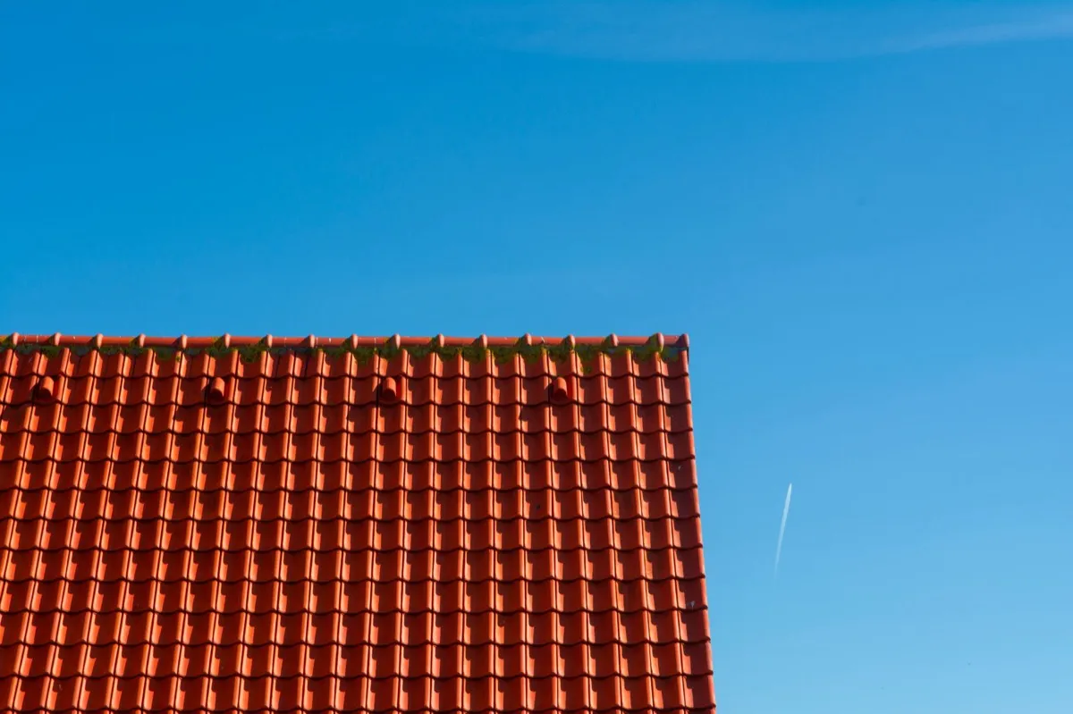 Tile roof gable in full sun, the kind of exposure that sets roof life in Hammond, IN